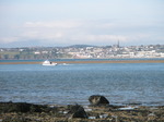 JT00033 Little boat leaving Rinnashark Harbour (Tramore).jpg